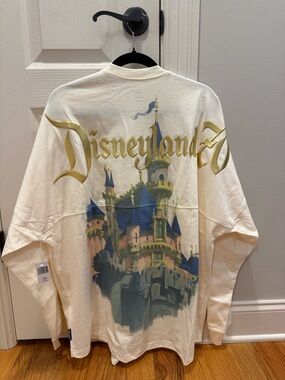 Disneyland Cream Long Sleeve Tee with Gold Script and Castle Graphic
